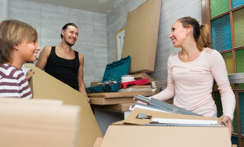 Moving boxes and furniture during a Rotherhithe home removal