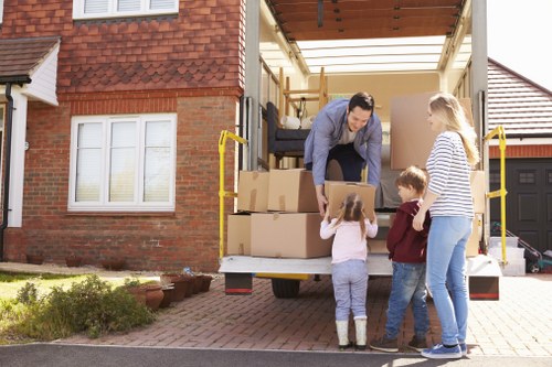 Removal team carrying out a safe moving operation with planning and care