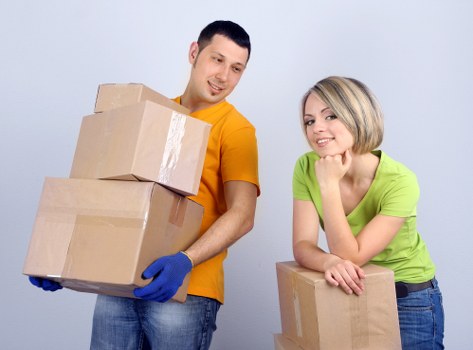 Packing boxes and preparing belongings for removals
