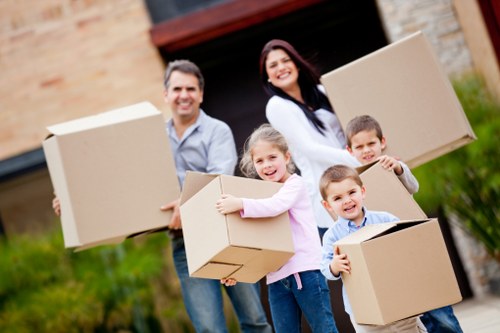 Local movers carrying furniture in Rotherhithe