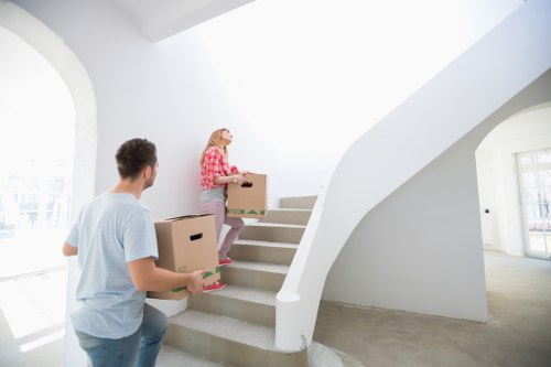 Professional movers loading furniture for a fast relocation in Rotherhithe
