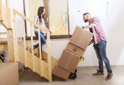 Packed boxes and furniture inside a moving truck